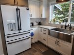 Kitchen - refrigerator and farmhouse sink